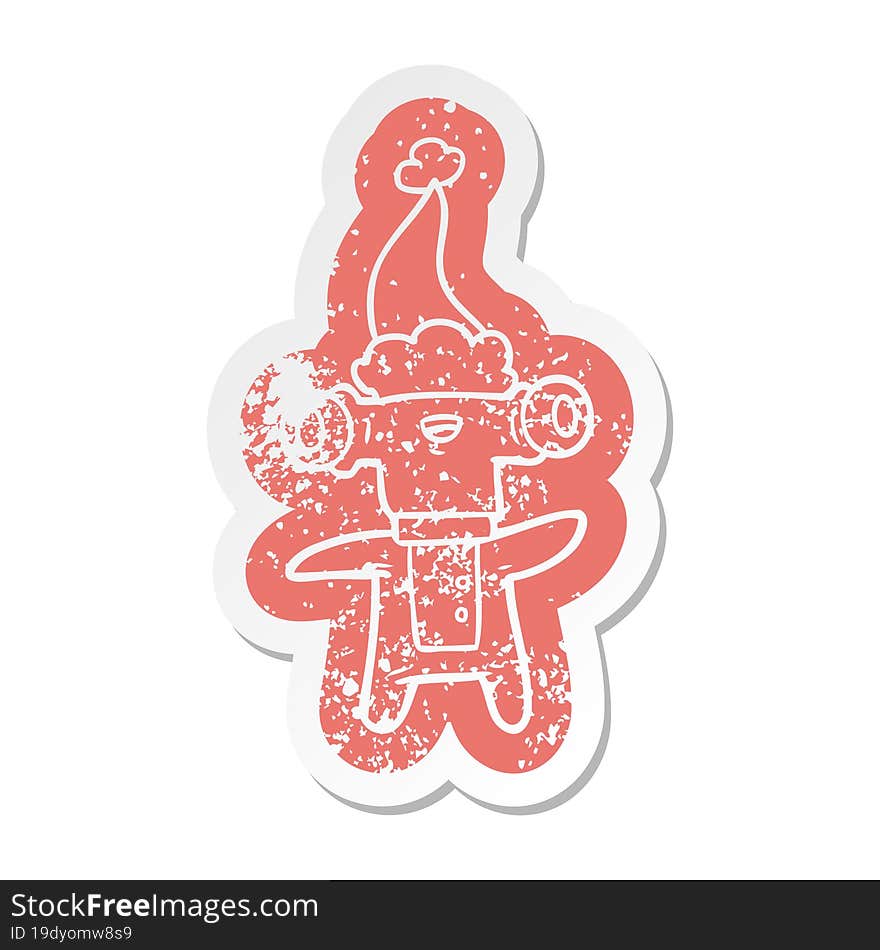 friendly cartoon distressed sticker of a alien wearing santa hat