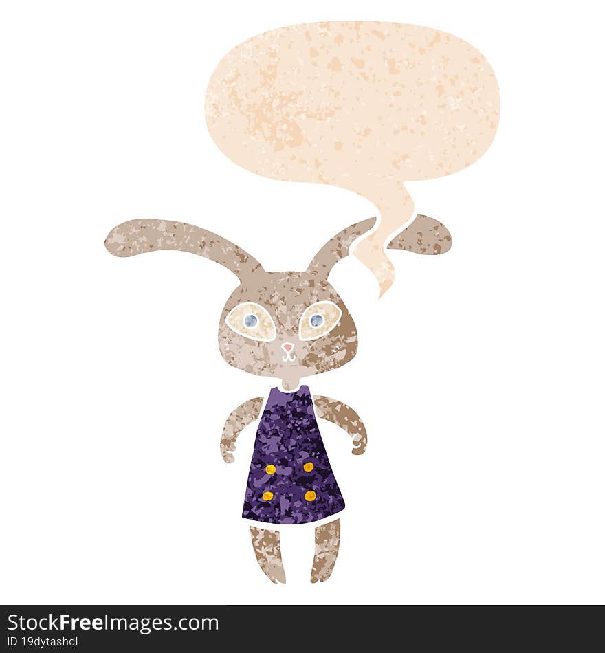 cute cartoon rabbit and speech bubble in retro textured style