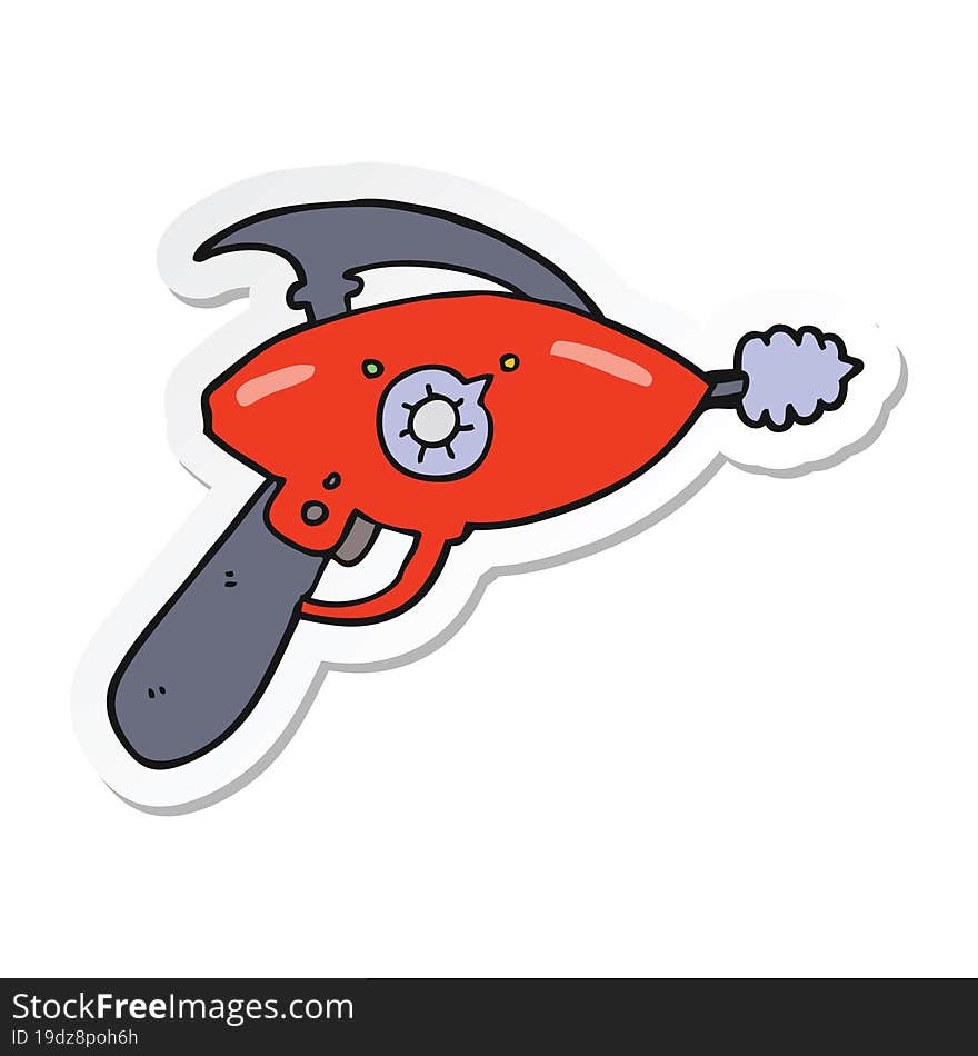 sticker of a cartoon ray gun