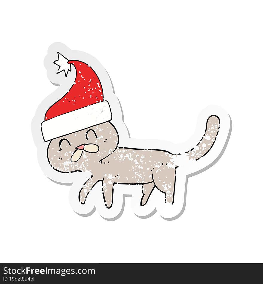 retro distressed sticker of a cartoon cat wearing christmas hat