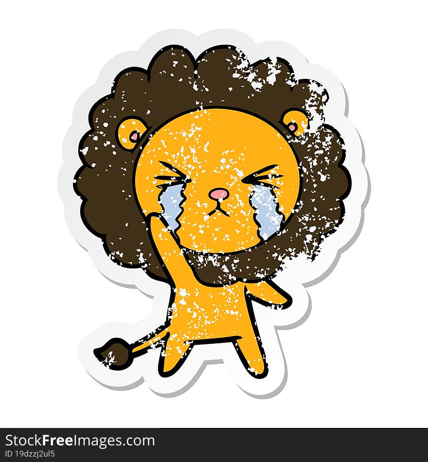 distressed sticker of a cartoon crying lion