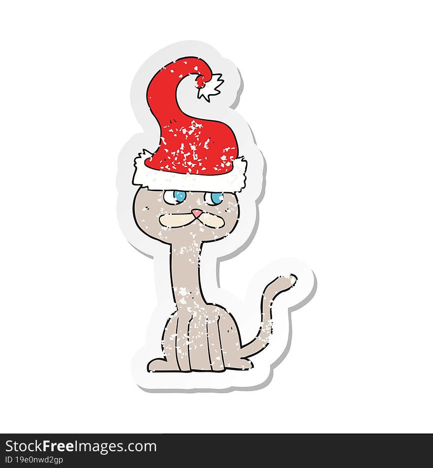 Retro Distressed Sticker Of A Cartoon Cat Wearing Christmas Hat