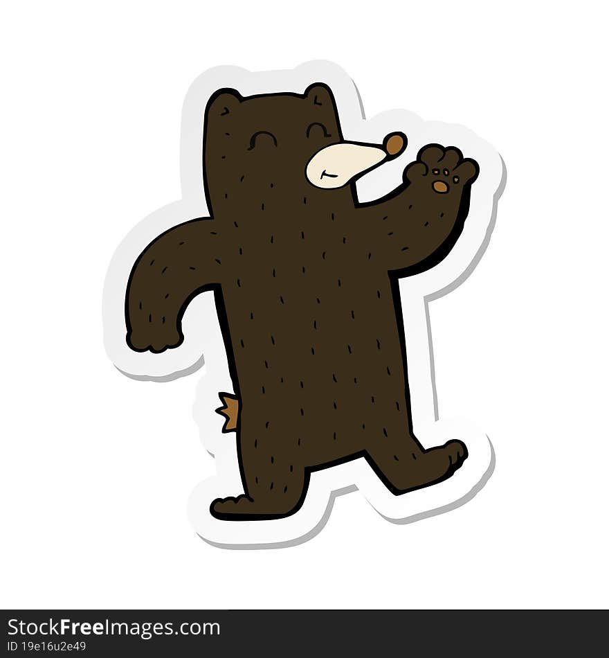 sticker of a cartoon waving black bear