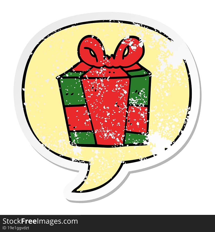 cartoon present and speech bubble distressed sticker