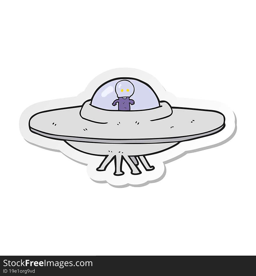 sticker of a cartoon alien flying saucer