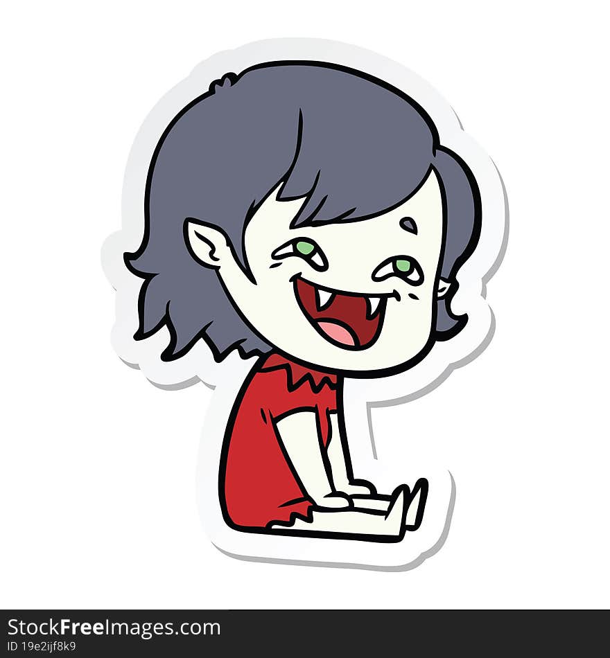 sticker of a cartoon laughing vampire girl