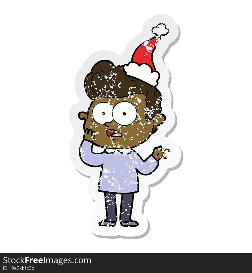 distressed sticker cartoon of a staring man wearing santa hat