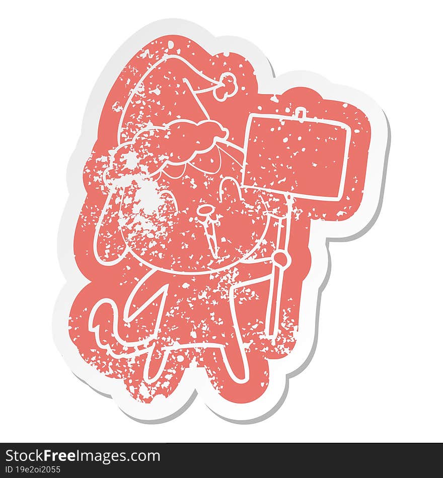 cute cartoon distressed sticker of a dog wearing santa hat