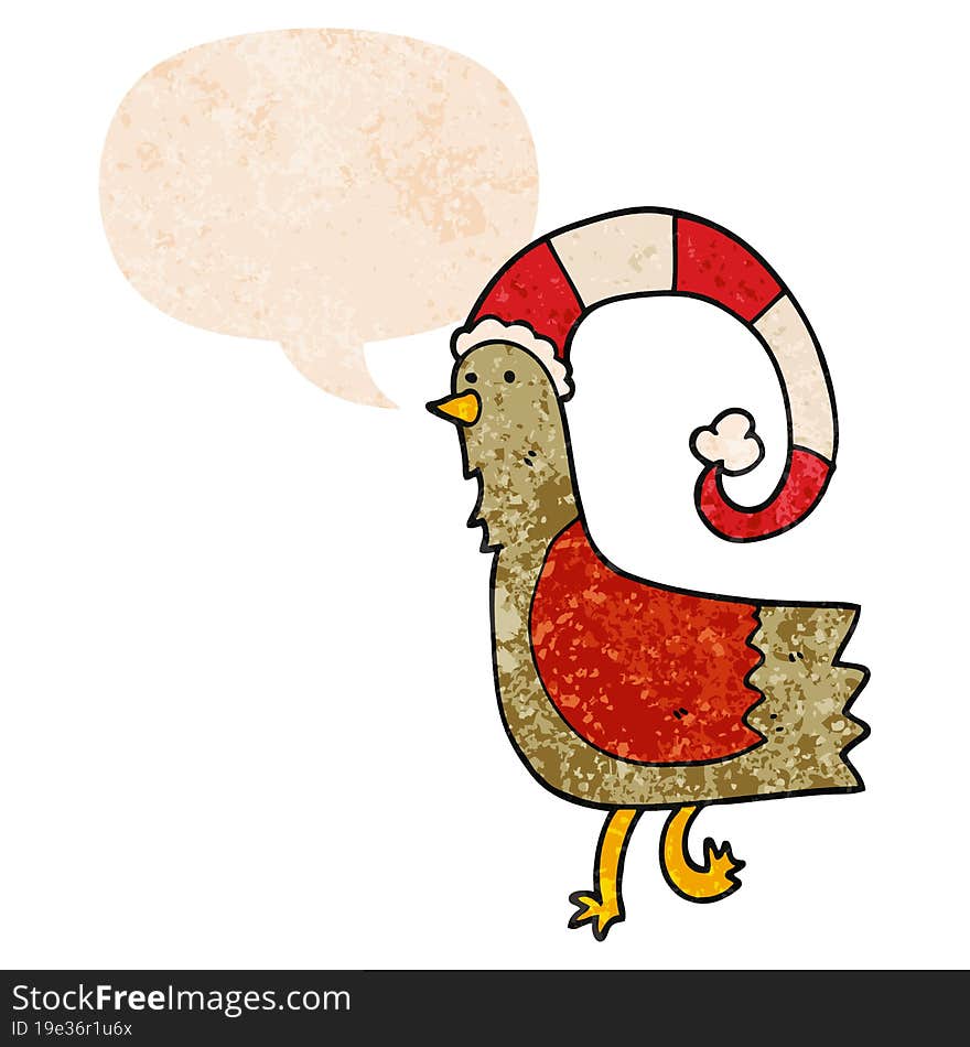 cartoon chicken in funny christmas hat and speech bubble in retro textured style