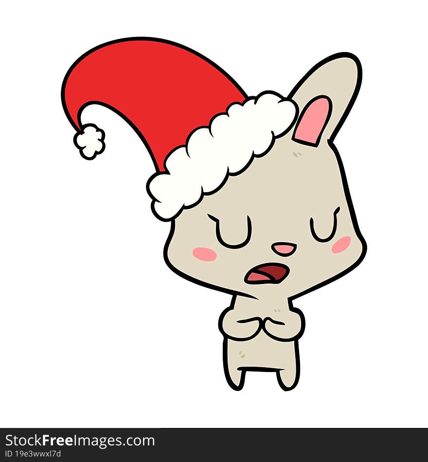 cartoon rabbit wearing christmas hat. cartoon rabbit wearing christmas hat