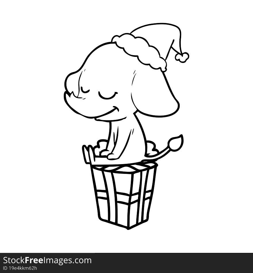 line drawing of a smiling elephant wearing santa hat