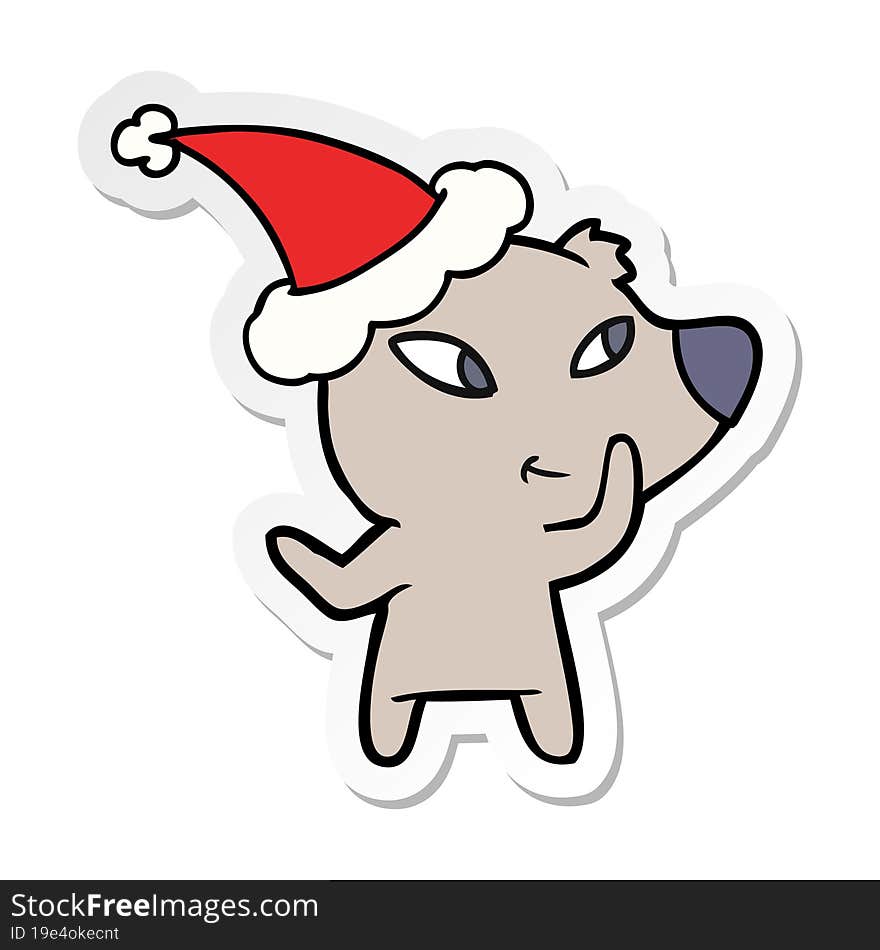 cute sticker cartoon of a bear wearing santa hat