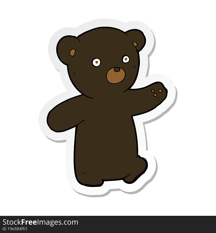 sticker of a cartoon black bear cub