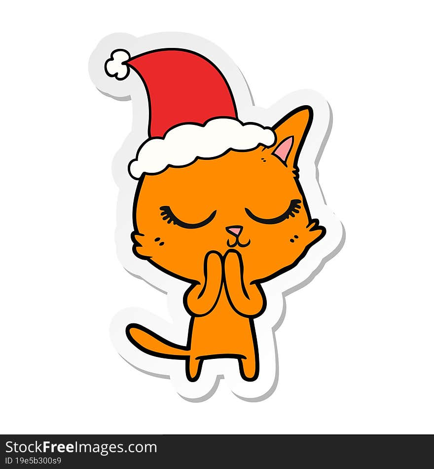 calm sticker cartoon of a cat wearing santa hat