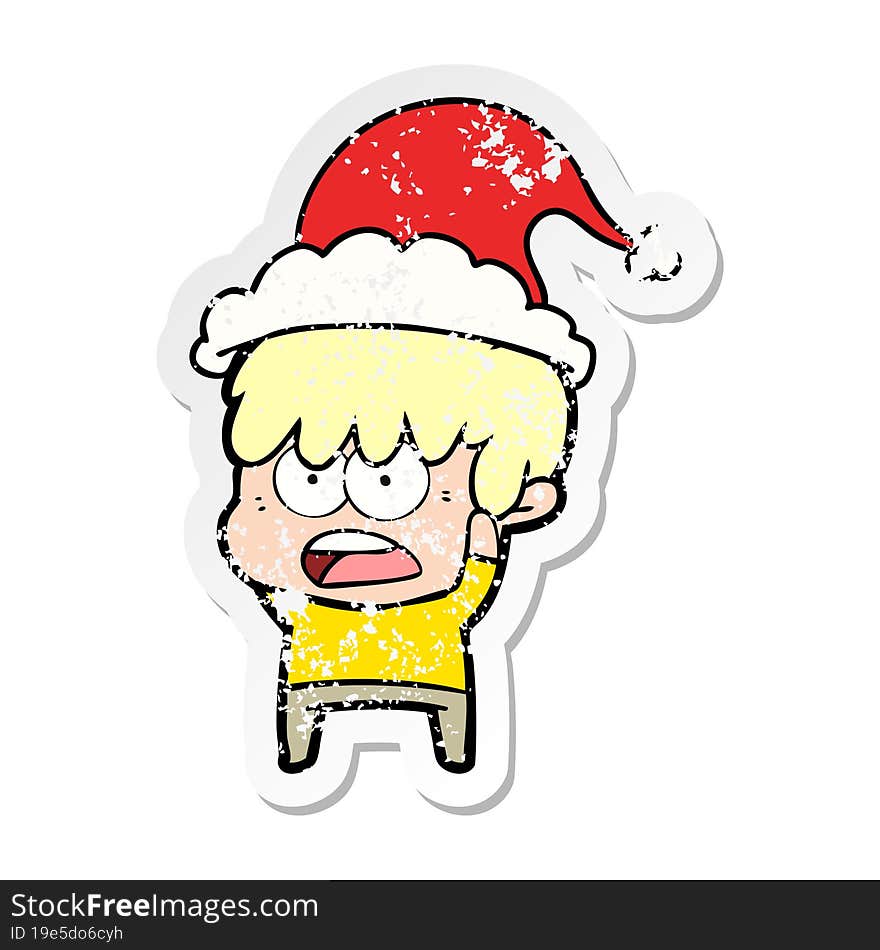 worried distressed sticker cartoon of a boy wearing santa hat