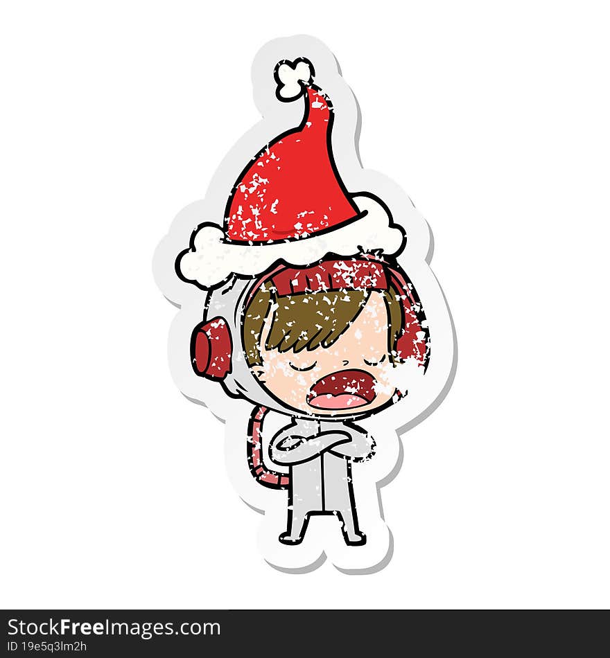 Distressed Sticker Cartoon Of A Astronaut Woman Explaining Wearing Santa Hat