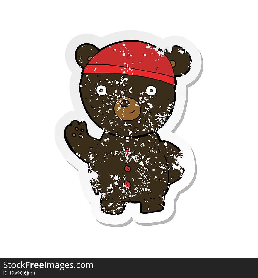 retro distressed sticker of a cartoon black bear cub