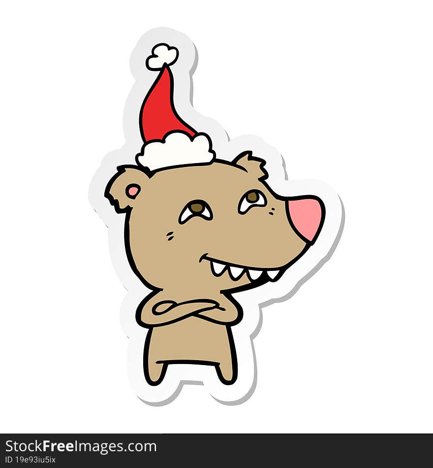 Sticker Cartoon Of A Bear Showing Teeth Wearing Santa Hat