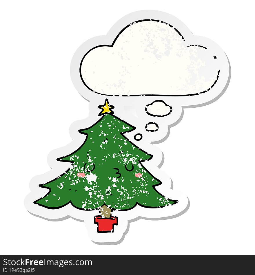 cute cartoon christmas tree and thought bubble as a distressed worn sticker