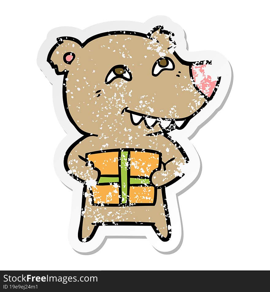 distressed sticker of a cartoon bear with present