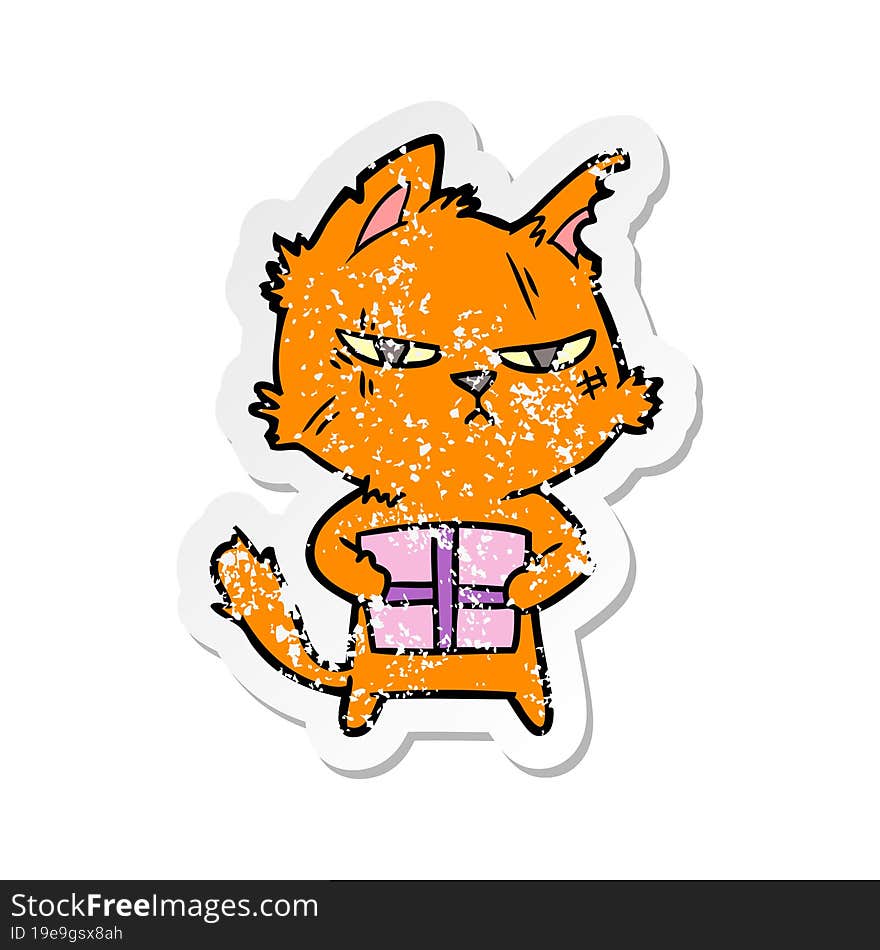 Distressed Sticker Of A Tough Cartoon Cat With Christmas Present