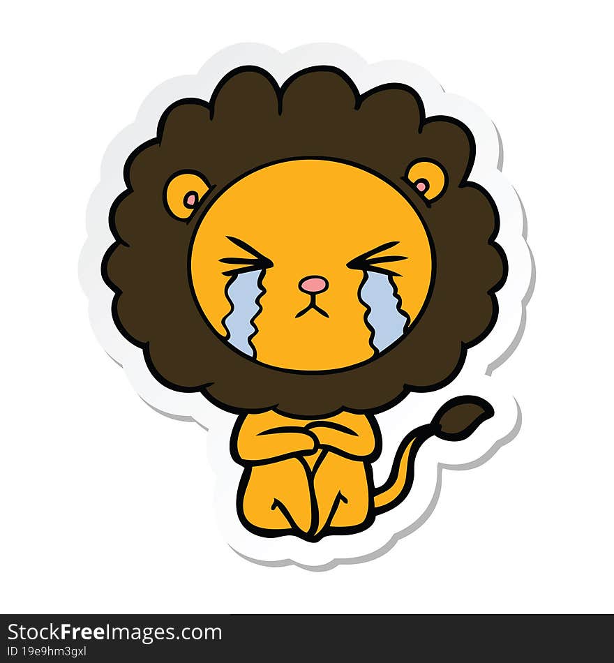 sticker of a cartoon crying lion sitting huddled up