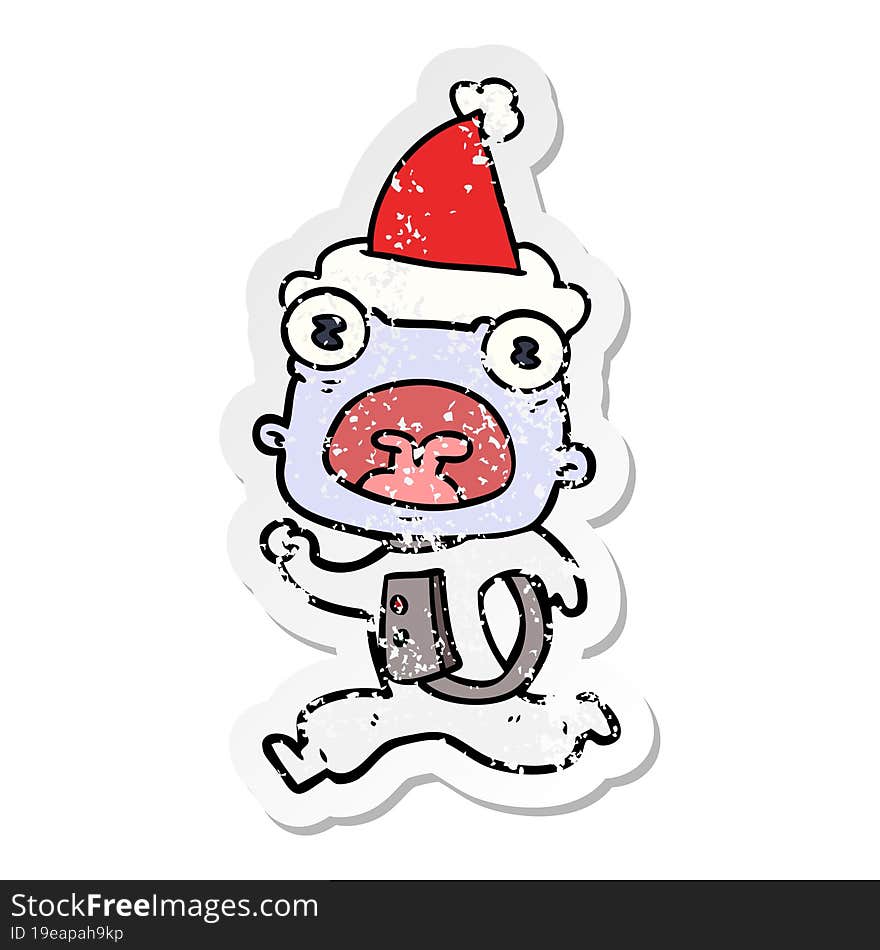 hand drawn distressed sticker cartoon of a weird alien running away wearing santa hat