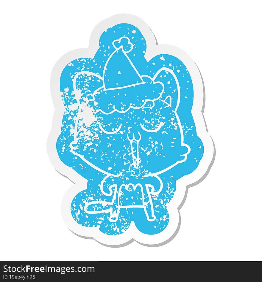 cartoon distressed sticker of a cat singing wearing santa hat