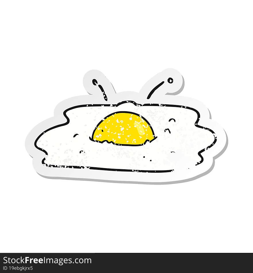 retro distressed sticker of a cartoon fried egg