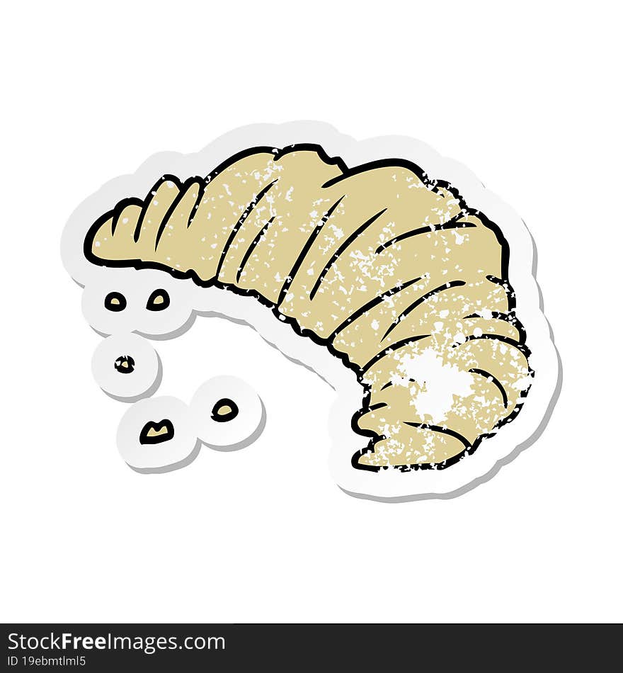 distressed sticker of a cartoon croissant