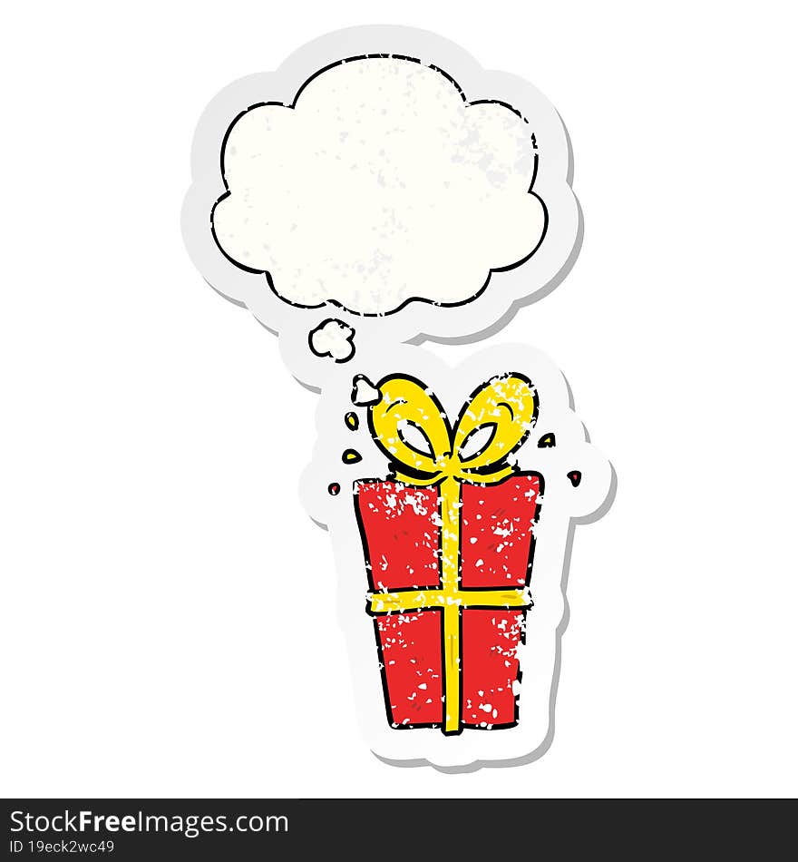 Cartoon Wrapped Gift And Thought Bubble As A Distressed Worn Sticker