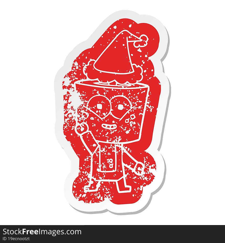 happy cartoon distressed sticker of a robot waving hello wearing santa hat