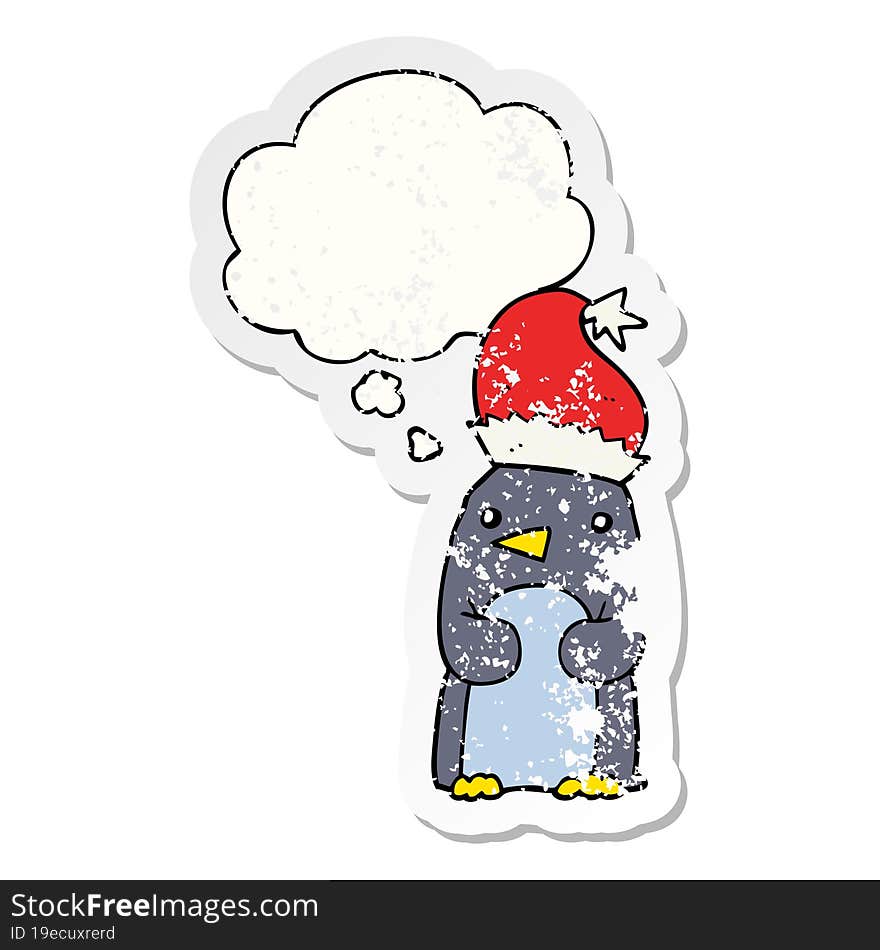 Cute Christmas Penguin And Thought Bubble As A Distressed Worn Sticker