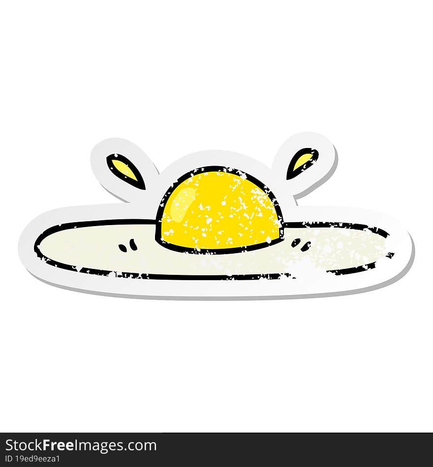 distressed sticker of a quirky hand drawn cartoon fried egg