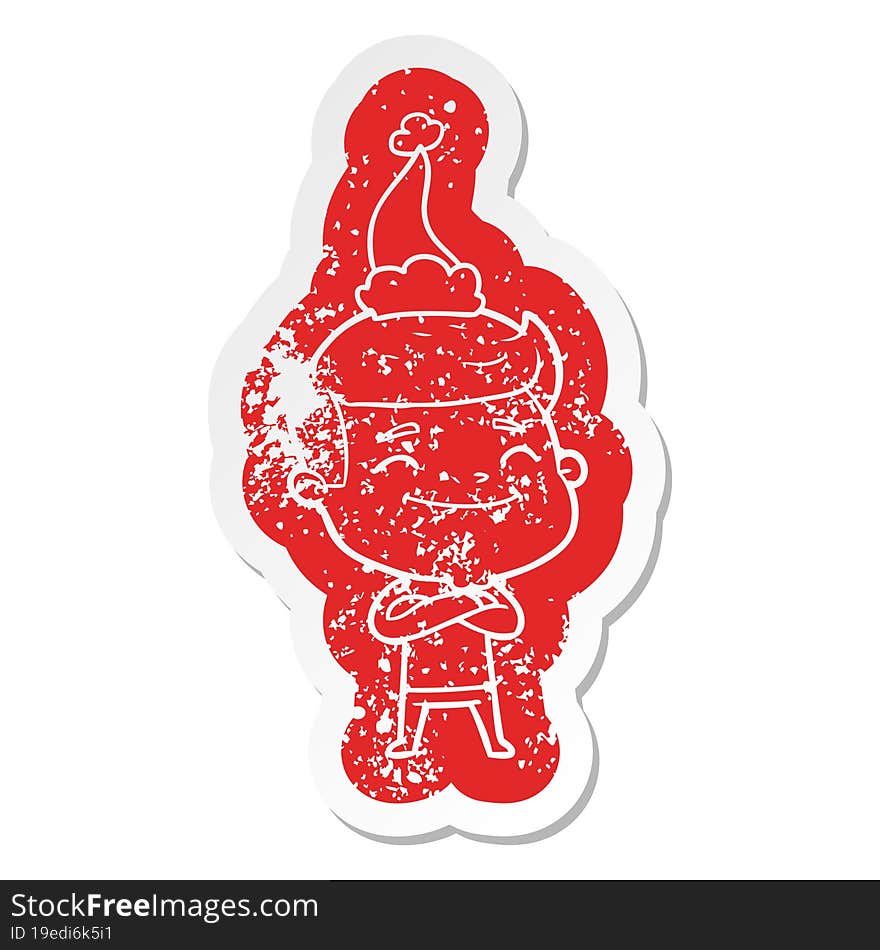 happy cartoon distressed sticker of a man wearing santa hat