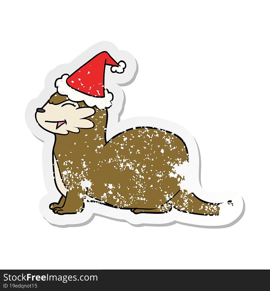 laughing otter hand drawn distressed sticker cartoon of a wearing santa hat