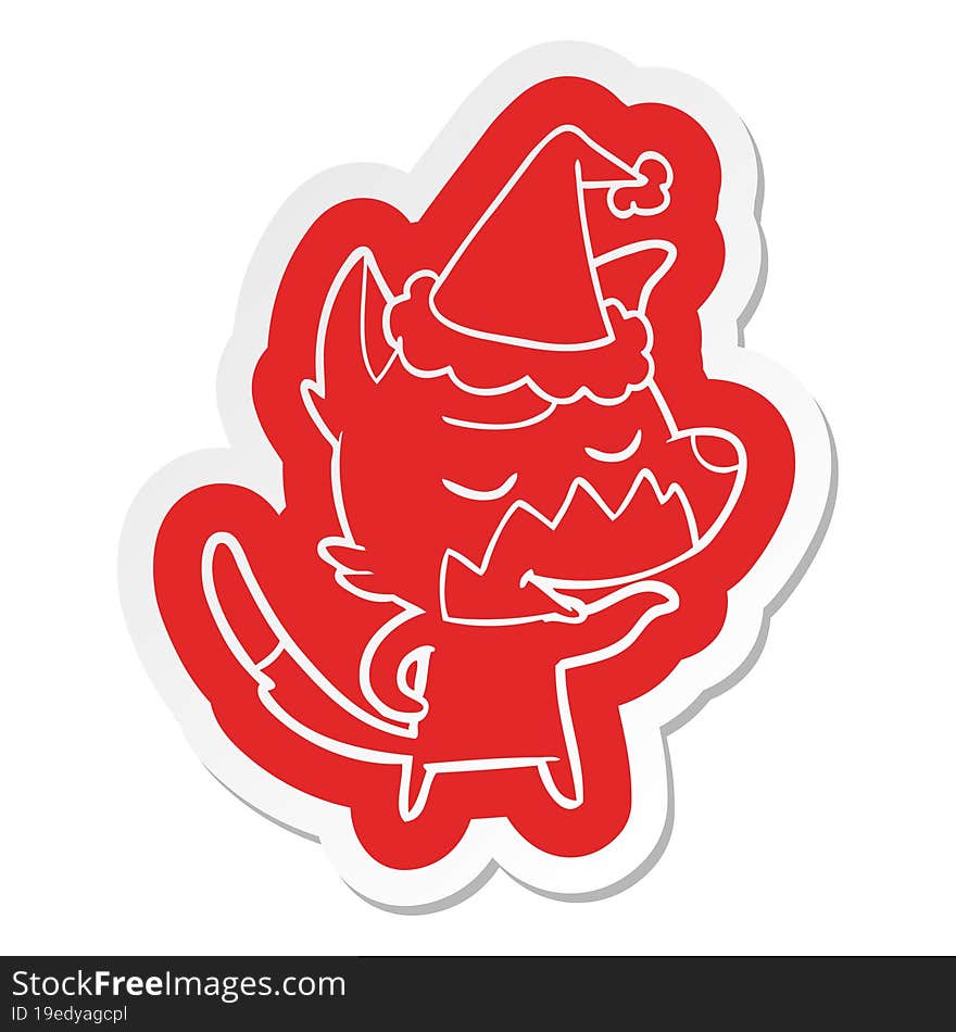 friendly cartoon  sticker of a fox wearing santa hat