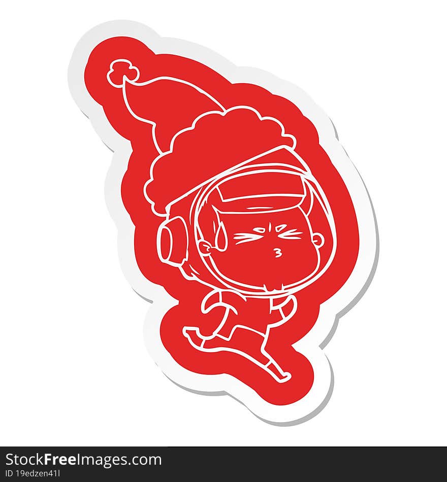 Cartoon  Sticker Of A Stressed Astronaut Wearing Santa Hat