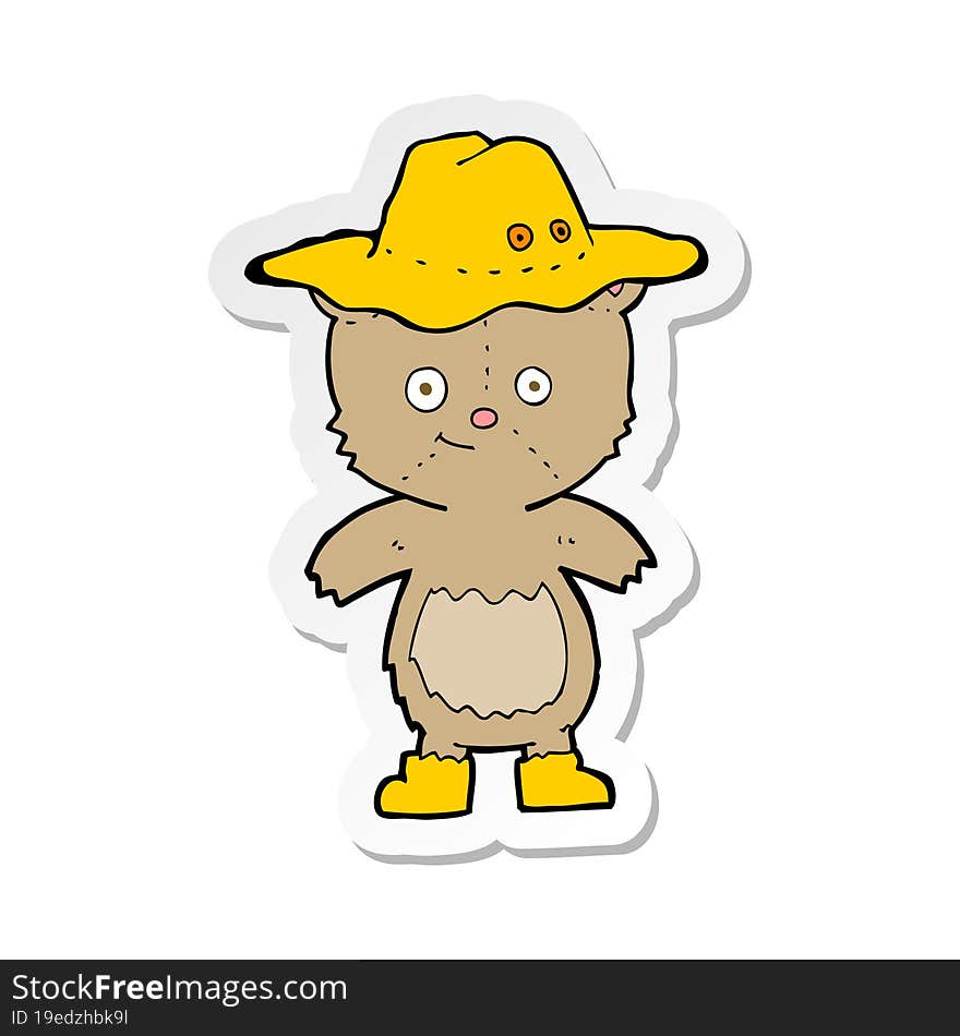 sticker of a cartoon bear in hat