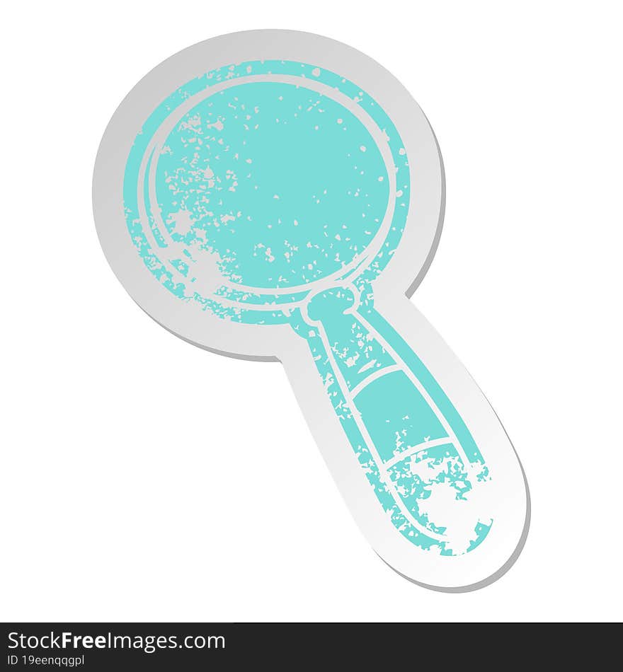 distressed old sticker of a magnifying glass