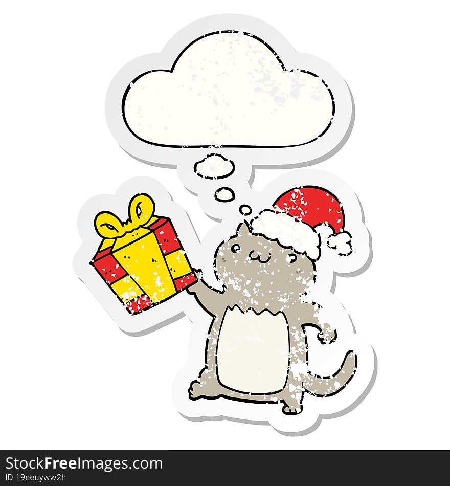 cute cartoon christmas cat and thought bubble as a distressed worn sticker