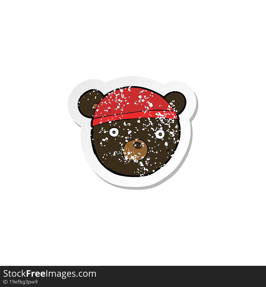 Retro Distressed Sticker Of A Cartoon Black Bear Cub Wearing Hat