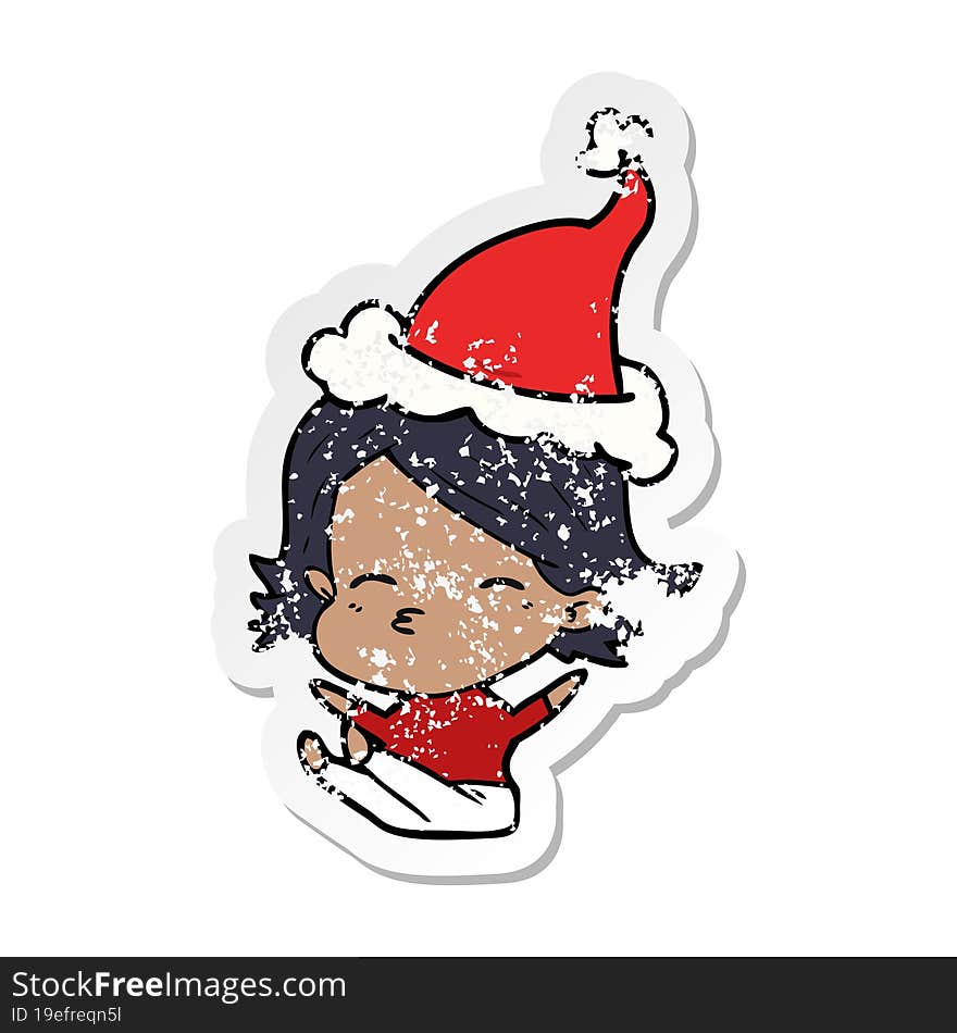 Distressed Sticker Cartoon Of A Woman Sitting Wearing Santa Hat