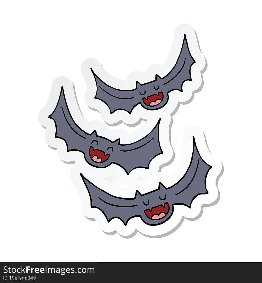 sticker of a cartoon vampire bats