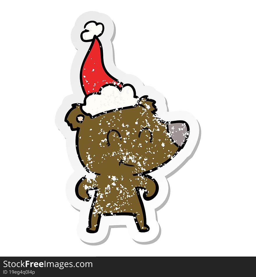 female bear distressed sticker cartoon of a wearing santa hat