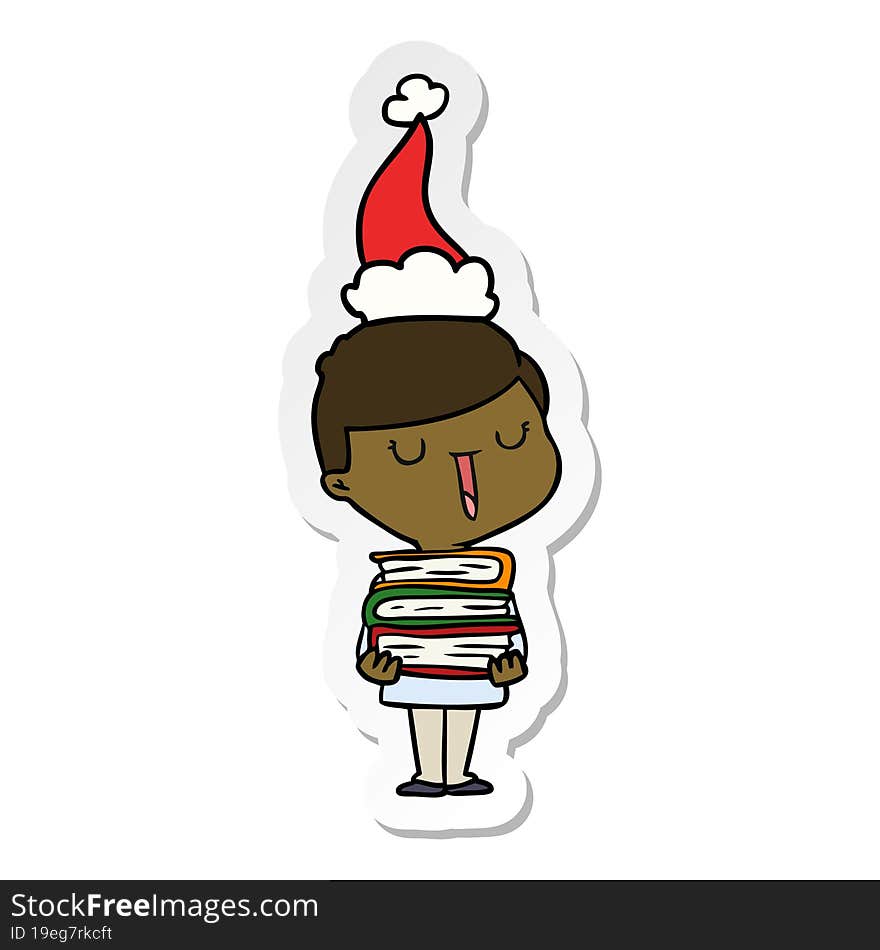 Sticker Cartoon Of A Happy Boy With Stack Of Books Wearing Santa Hat