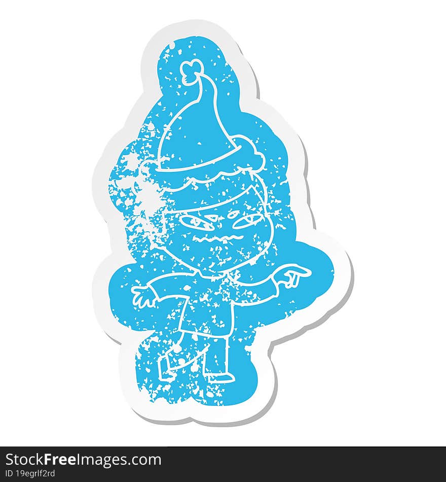 Cartoon Distressed Sticker Of A Angry Man Pointing Wearing Santa Hat