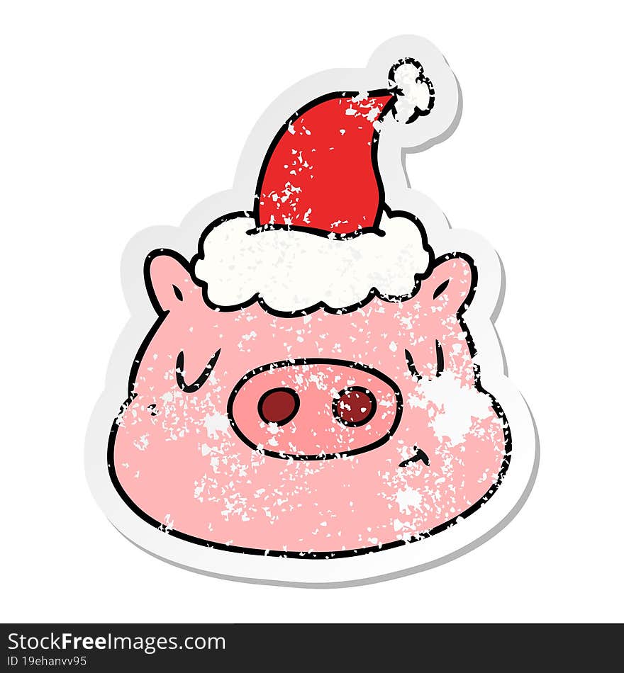 hand drawn distressed sticker cartoon of a pig face wearing santa hat