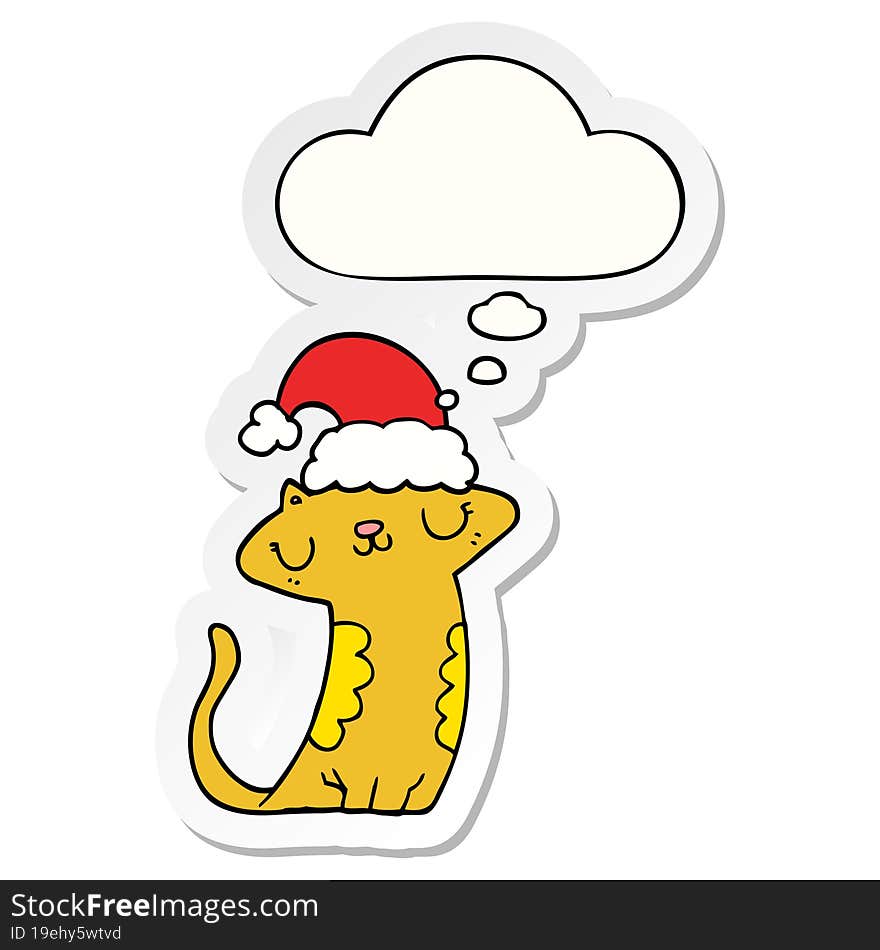 cute cartoon cat wearing christmas hat with thought bubble as a printed sticker