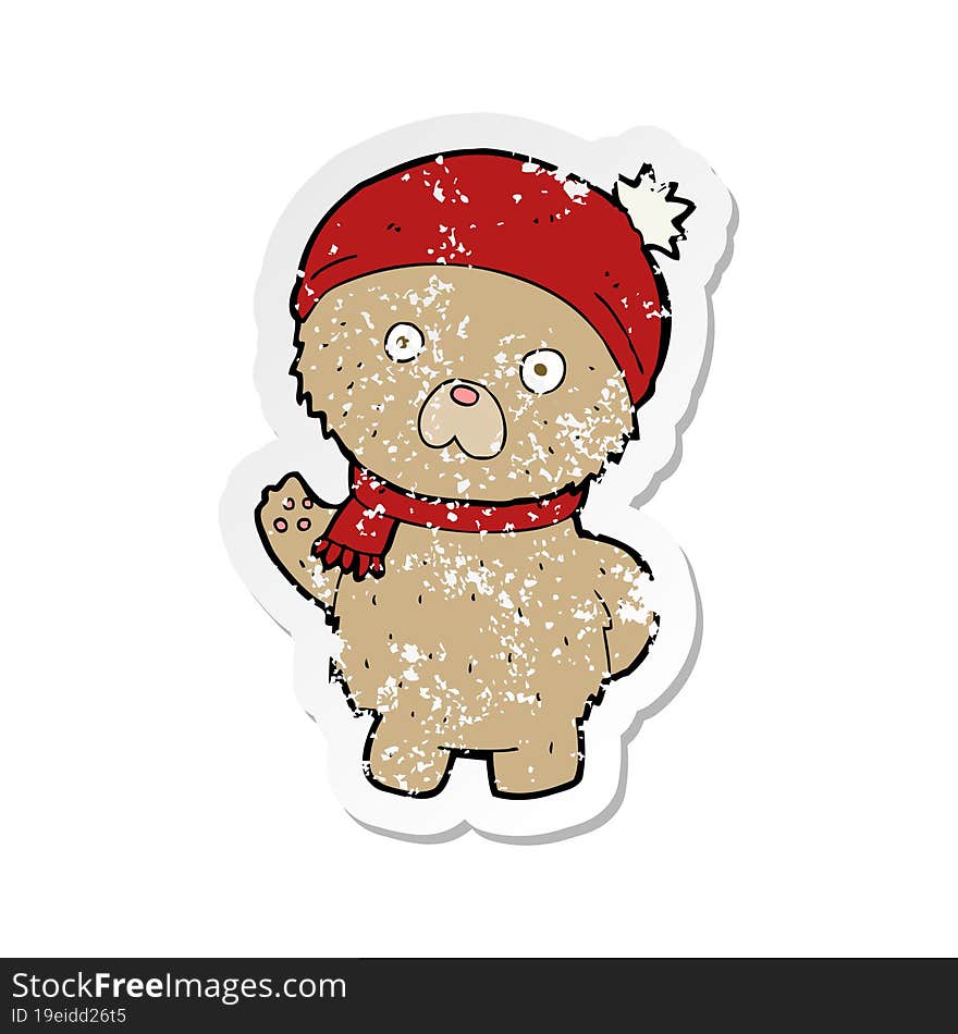 Retro Distressed Sticker Of A Cartoon Teddy Bear In Winter Hat And Scarf